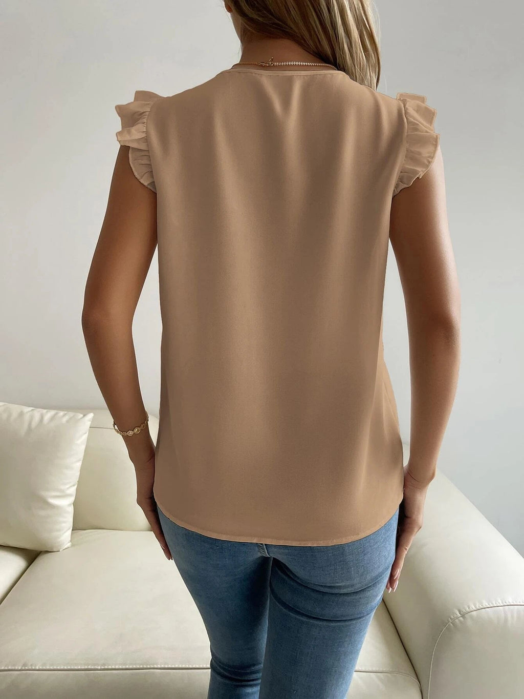 Blusa Sem Mangas com Decote em V - Romênia